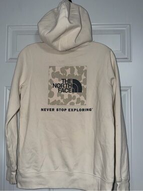 The North Face Cream Hoodie with Camo Square Logo